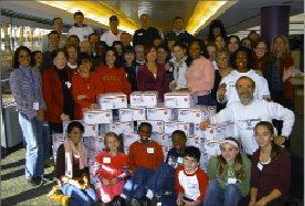 Holiday Mail for Heroes Pitney Bowes WHQ PB and Red Cross Volunteers.tif
