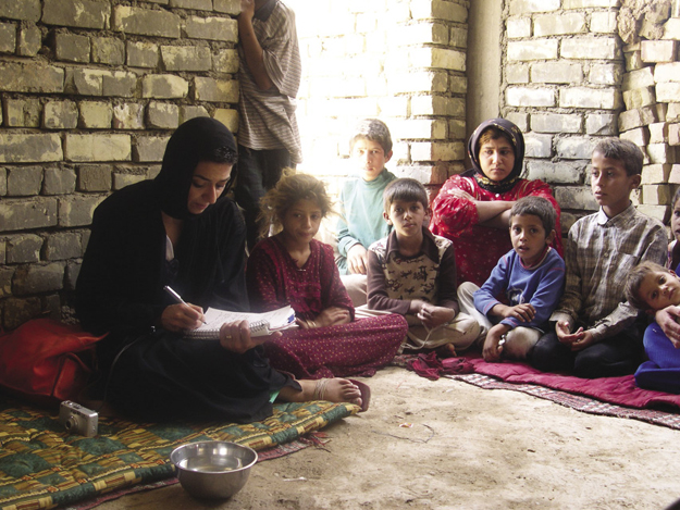 Zainab Salbi recording the stories of women in Iraq