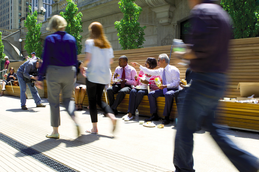 Mayor Emanuel eating lunch on the new Riverwalk