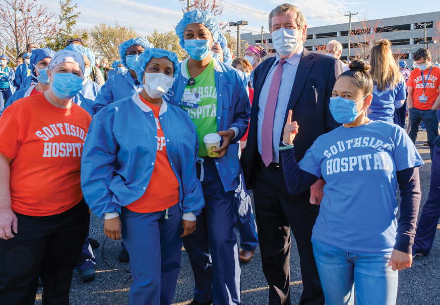 Michael Dowling with front line caregivers at Southside Hospital