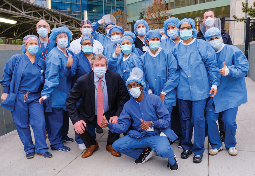 Michael Dowling with staff of Long Island Jewish Hospital