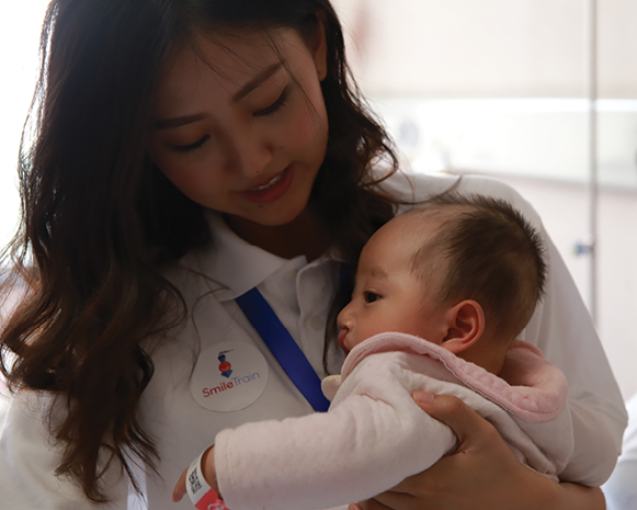 Yue-Sai Kan Miss Universe China at a Smile Train event